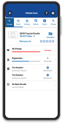 A smartphone using GEICO Mobile's app for vehicle care