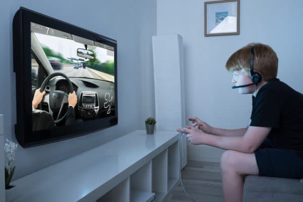 teen-playing-video-game