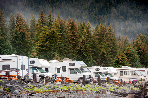 Motorized Recreational Vehicles (RVs) parked side by side